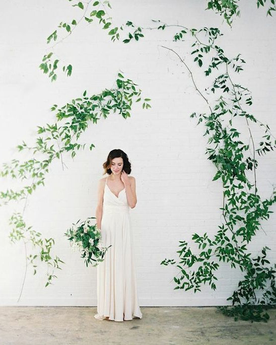 Natural Smilax vine adding garden-inspired style to event décor